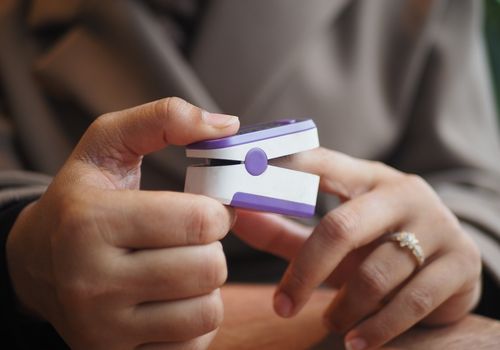 Image of a man checking bloody oxygen levels